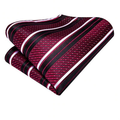 Rode stippen, zwart-wit gestreepte stropdas