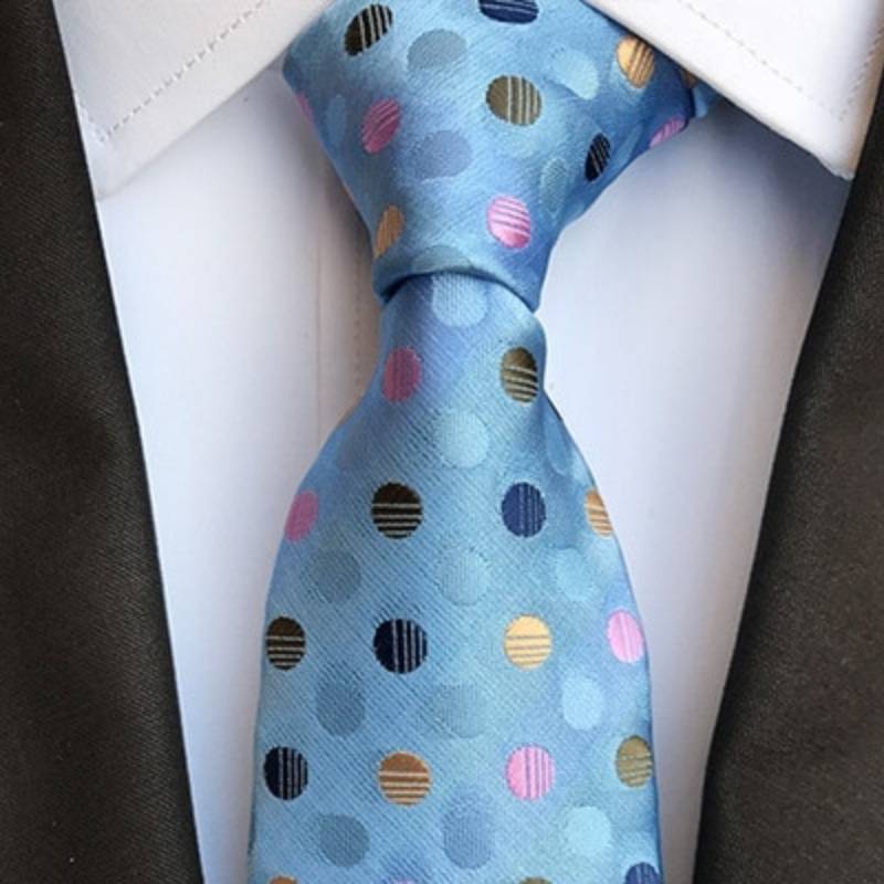 Hemelsblauwe stropdas met veelkleurige stippen