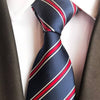 Donkerblauwe stropdas met rode strepen