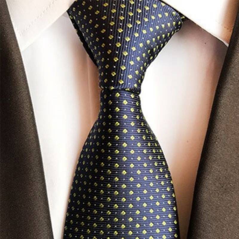 Marineblauwe stropdas met gele en witte stippen