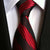 Donker bordeauxrode stropdas met rode strepen