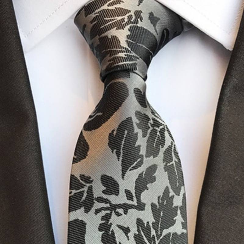 Grijze stropdas met zwarte bloemen