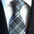 Grijze stropdas met hemelsblauwe en zwarte strepen