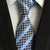 Grijze stropdas met lichtblauwe strepen en patroon
