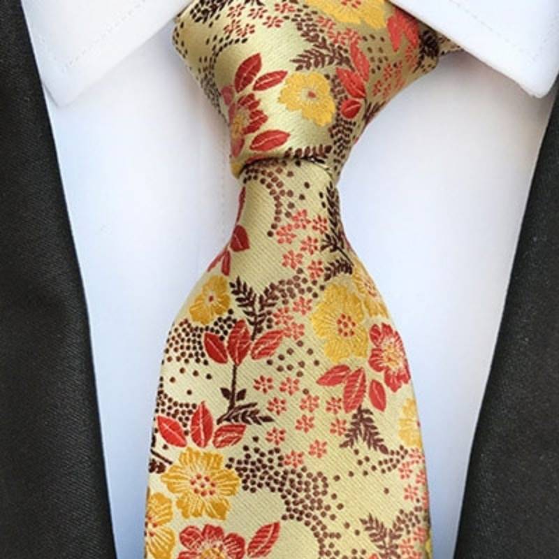 Gele stropdas met gele en rode bloemen