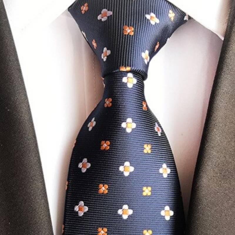 Avondjurk met witte en oranje bloemen