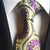 Lichtgroene stropdas met paars patroon