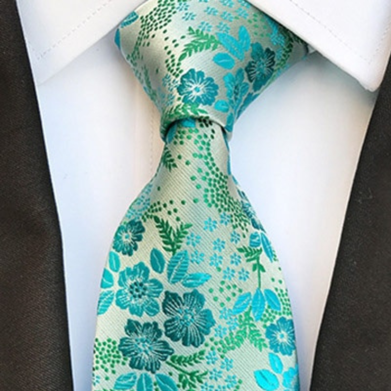 Groene stropdas met turkooisblauwe bloemen