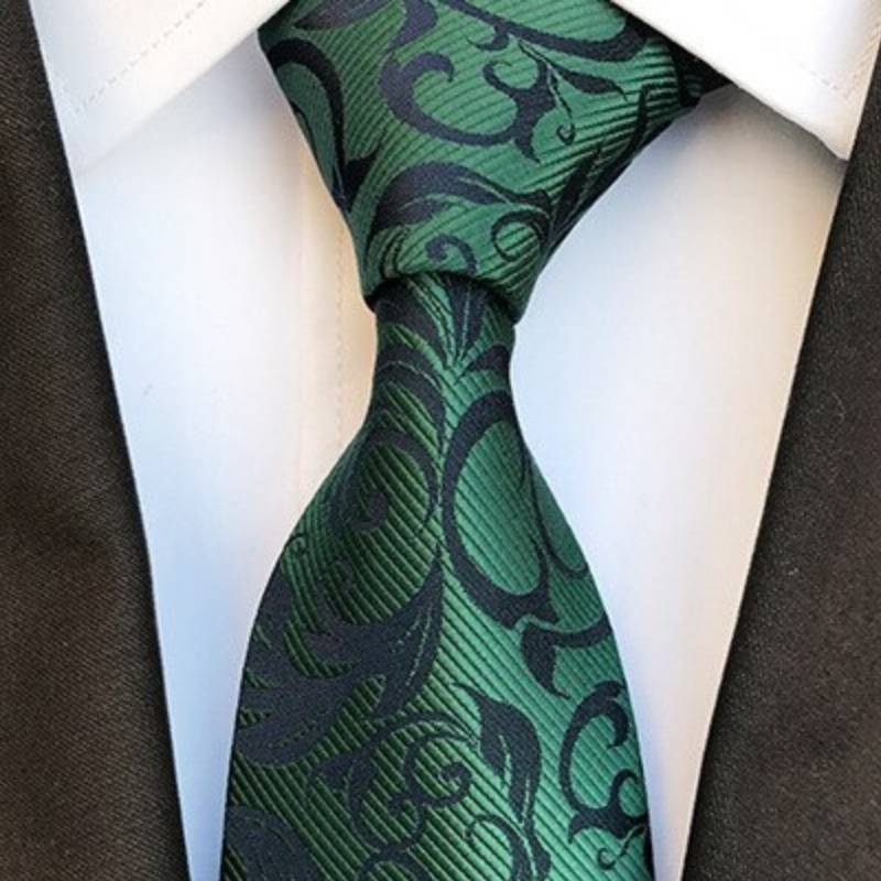 Groene stropdas met zwarte bloemen