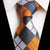 Wit, oranje en grijs geblokte stropdas