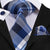 Blauw, grijs en wit geblokte stropdas