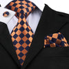 Oranje en zwarte geruite stropdas