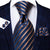 Marineblauw en beige gestreepte stropdas