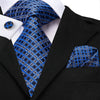Blauw en grijs geblokte stropdas