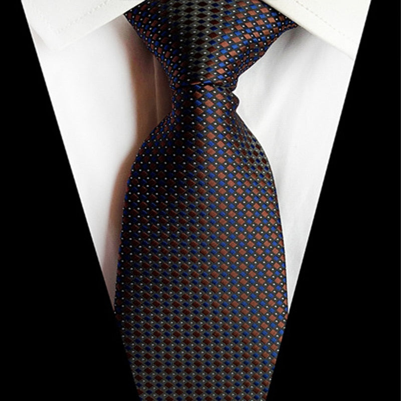 Marineblauwe en bruine stropdas met stippen