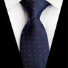 Marineblauwe stropdas met rode en paarse stippen